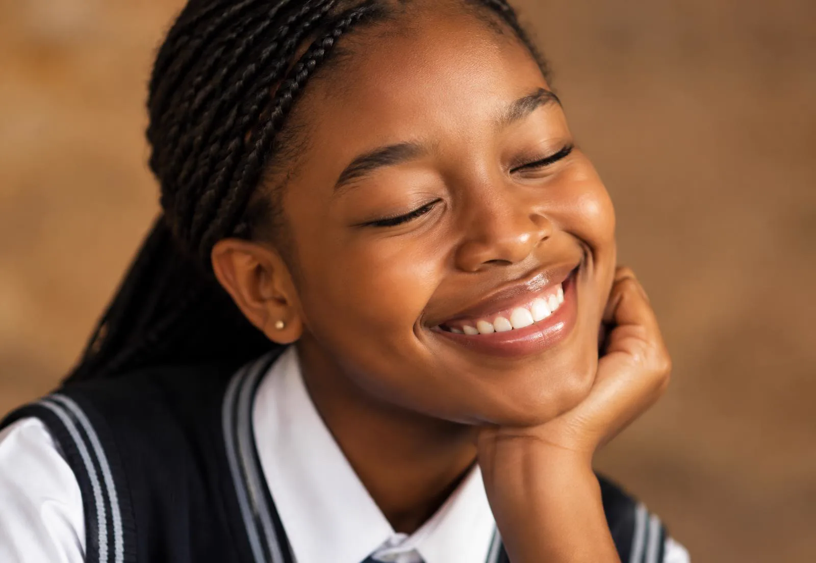 A young African learner smiling